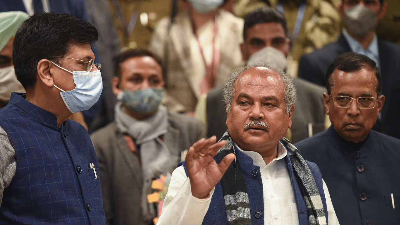 Union Minister for Agriculture and Farmers Welfare Narendra Singh Tomar (C) along with Minister for Commerce and Industry Piyush Goyal (L) and Minister of State Som Prakash. Credit: PTI File Photo