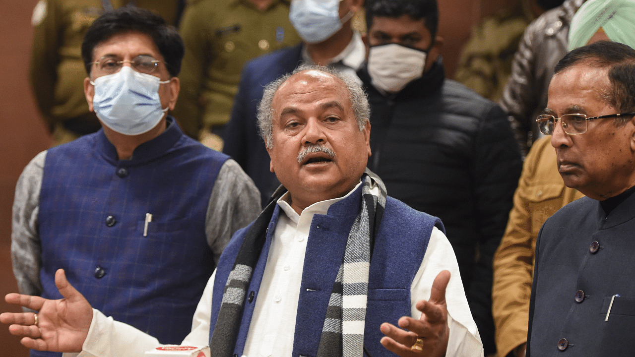 Union Minister for Agriculture and Farmers Welfare Narendra Singh Tomar (C) along with Minister for Commerce and Industry Piyush Goyal and Minister of State Som Prakash addresses media after the 10th round of meeting with farmer leaders on new agri law at Vigyan Bhawan, in New Delhi, Wednesday, Jan 20, 2021. Credit: PTI Photo