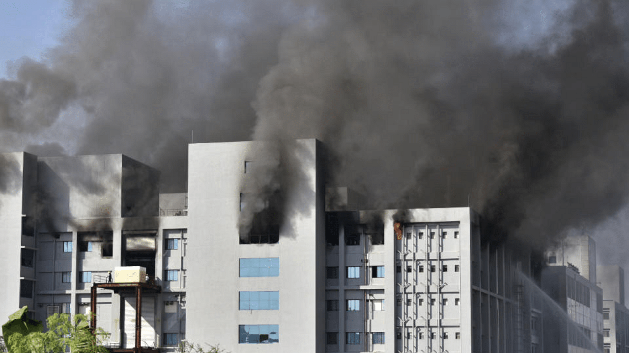 Smoke rises after a fire broke out at India's Serum Institute in Pune on January 21, 2021. Credit: AFP Photo