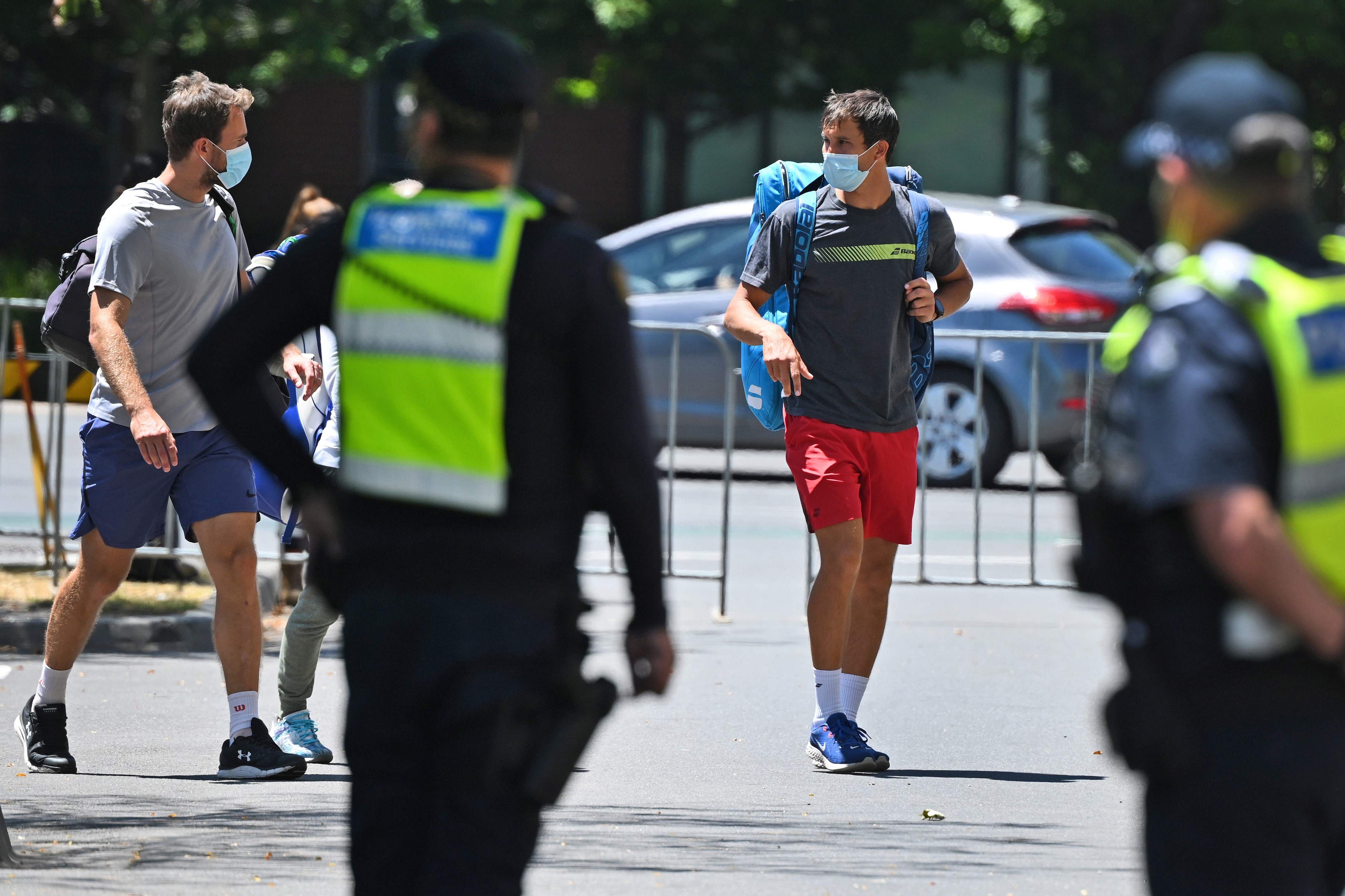 Tennis players return to their hotel after a practice session. Credit: AFP Photo