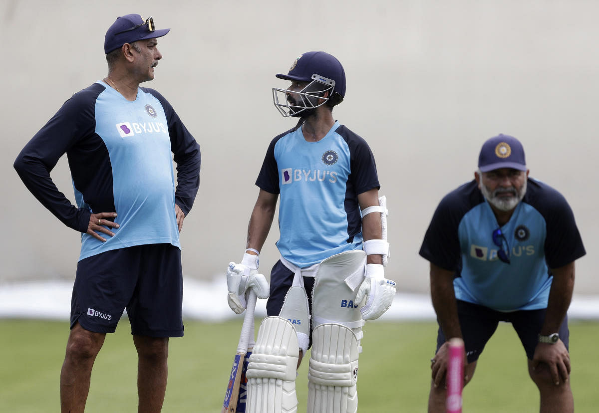 Head coach Ravi Shastri (left) and bowling coach Bharat Arun (right) hatched the leg-side trap while stand-in skipper Ajinkya Rahane executed the plan well on the field. AP-PTI