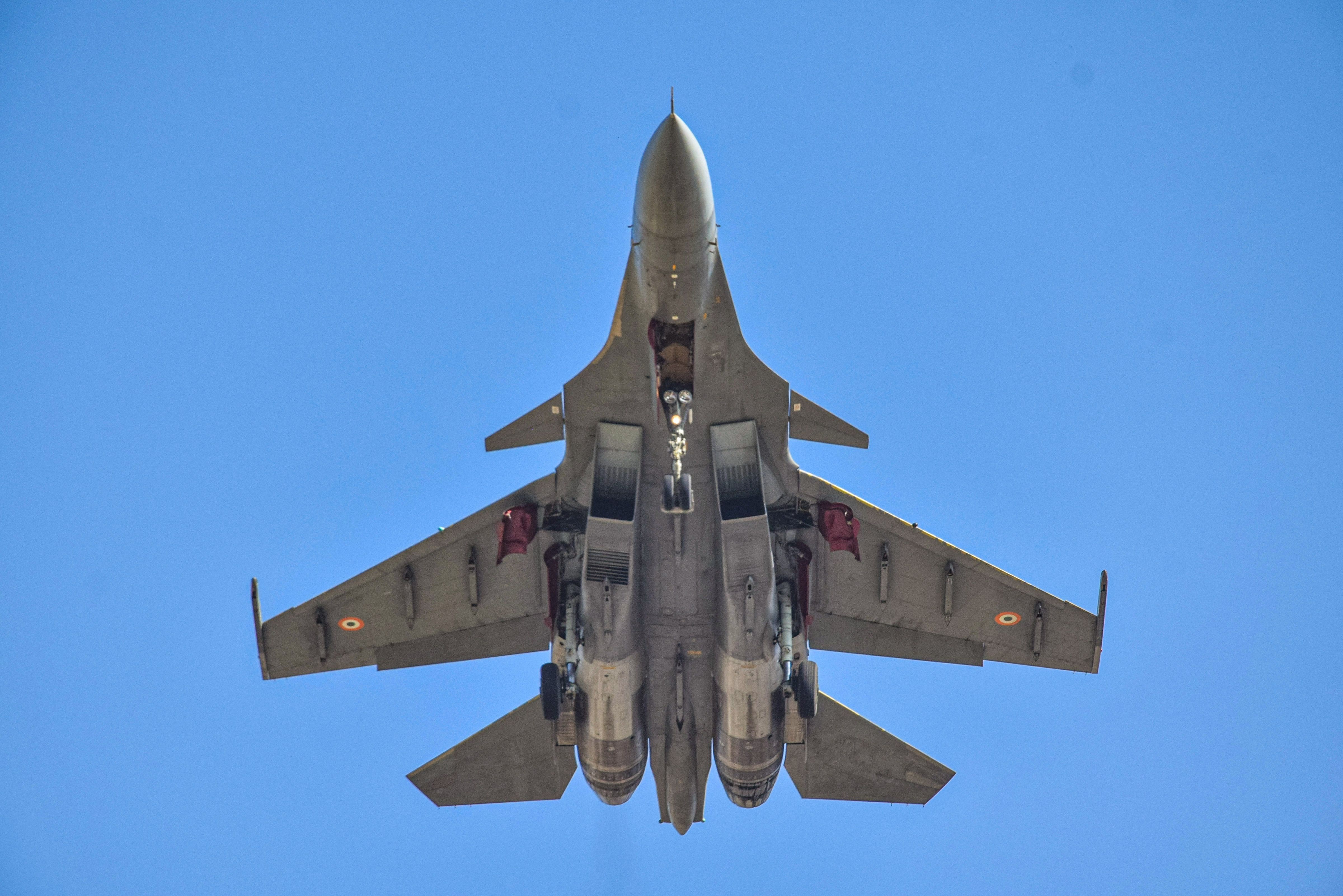 Su-30 MKI jet flies over the city during the 'Ex-Desert Knight 21', a five-day mega air exercise with French air and space force, in Jodhpur, Thursday, Jan. 21, 2021. IAF deployment in the exercise includes Mirage 2000, Su-30 MKI, Rafale, IL-78 flight refuelling aircraft and airborne warning and control system (AWACS). Credit: PTI Photo
