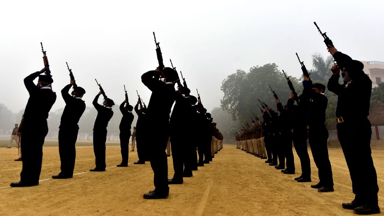 UP Police contingent during the rehearsal for Republic Day Parade 2021, on a cold and foggy morning, in Prayagraj. Credit: PTI Photo