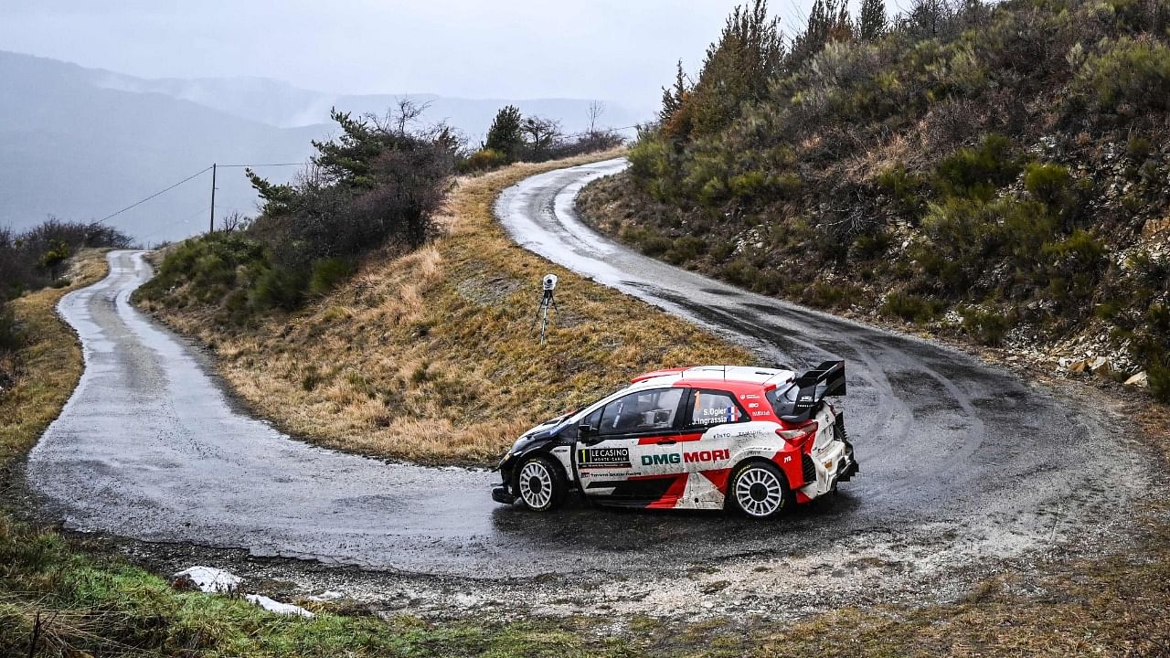 France's pilot Sebastien Ogier and co-pilot Julien Ingrassia drive their Toyota Gazoo Racing WRT during the ES7 special of the second stage of the WRC season-opening Monte Carlo Rally between Chalancon and Gumiane near Gap on January 22, 2021. Credit: AFP Photo