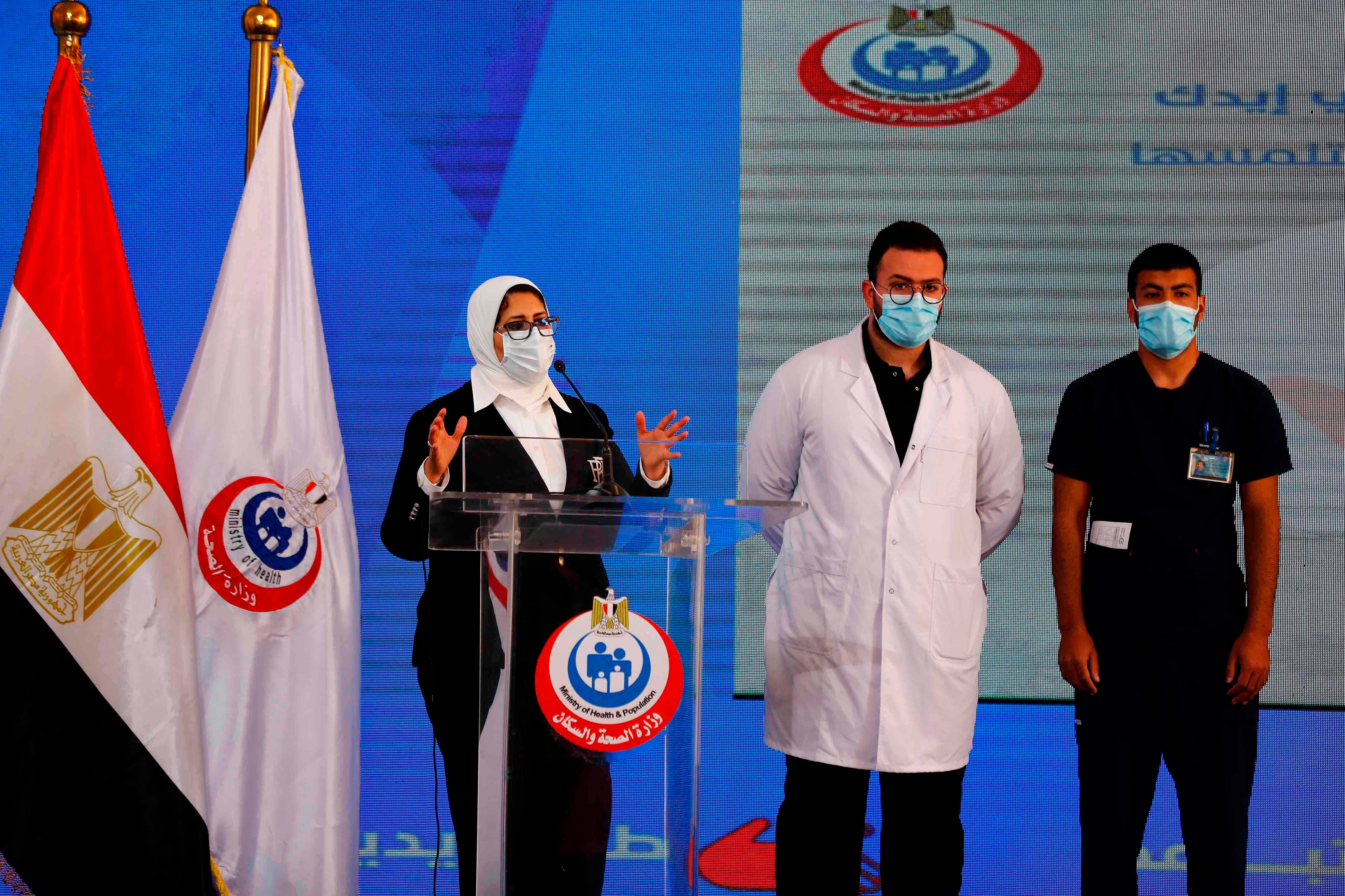 Egyptian Health Minister Hala Zayed gives a press conference, accompanied by doctor Abdelmouim Selem and medical staff member Ahmed Hemdan. Credit: AFP Photo