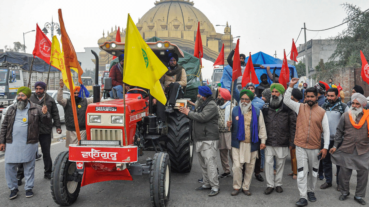 Farmers march towards Delhi, to join their agitation against the Centre's farm reform laws, in Amritsar. Credit: PTI Photo