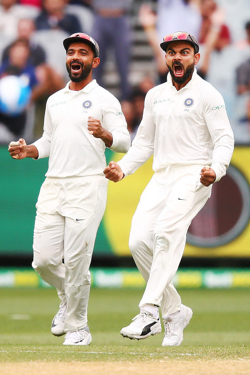 Virat Kohli (right) and Ajinkya Rahane are contrasting personalities, yet they have found a way to succeed as captains. Credit: Getty Images