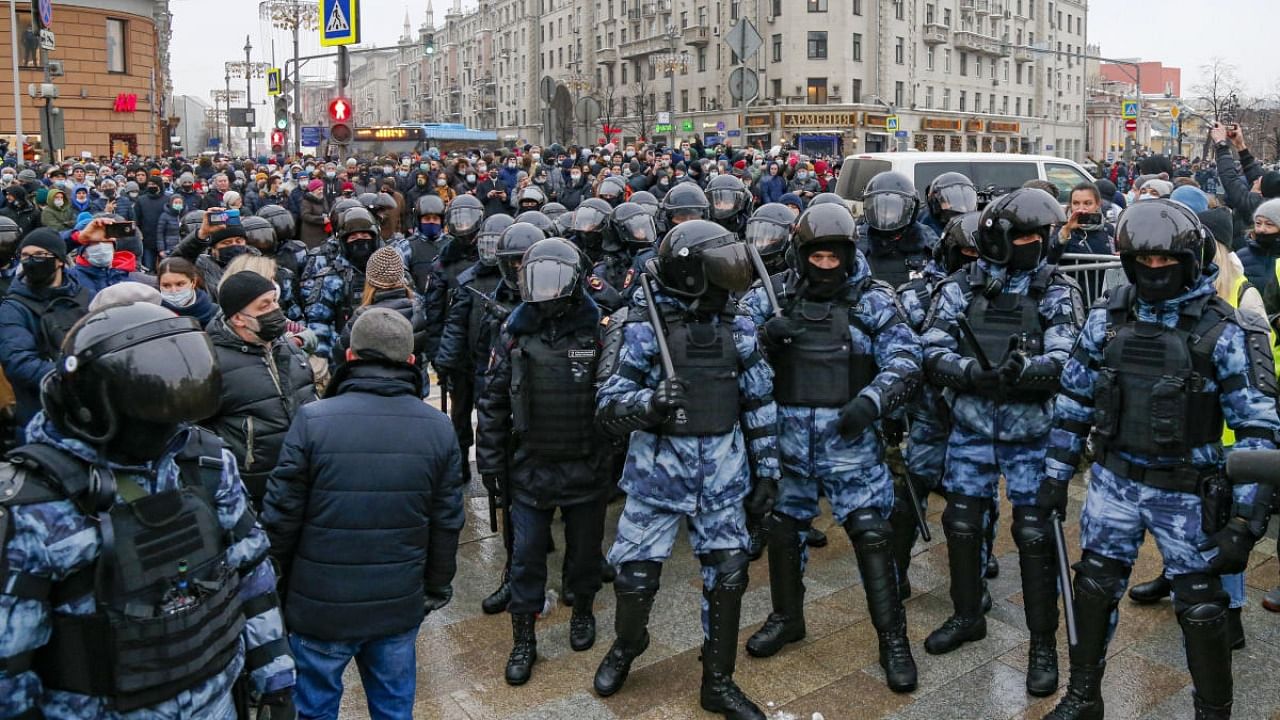 Riot police block demonstrators gathering during a protest against the jailing of opposition leader Alexei Navalny in Pushkin square in Moscow. Credit: AP/PTI.