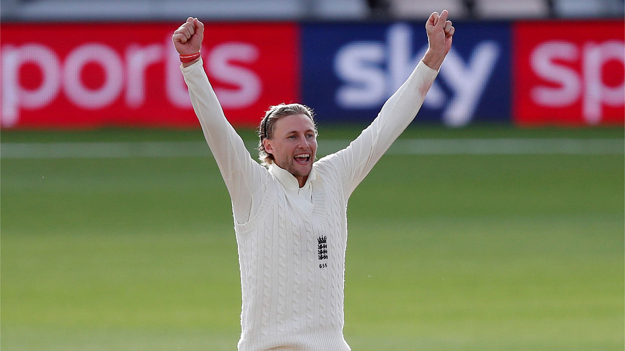 England's Joe Root celebrates the wicket of Pakistan's Asad Shafiq. Credit: Reuters Photo