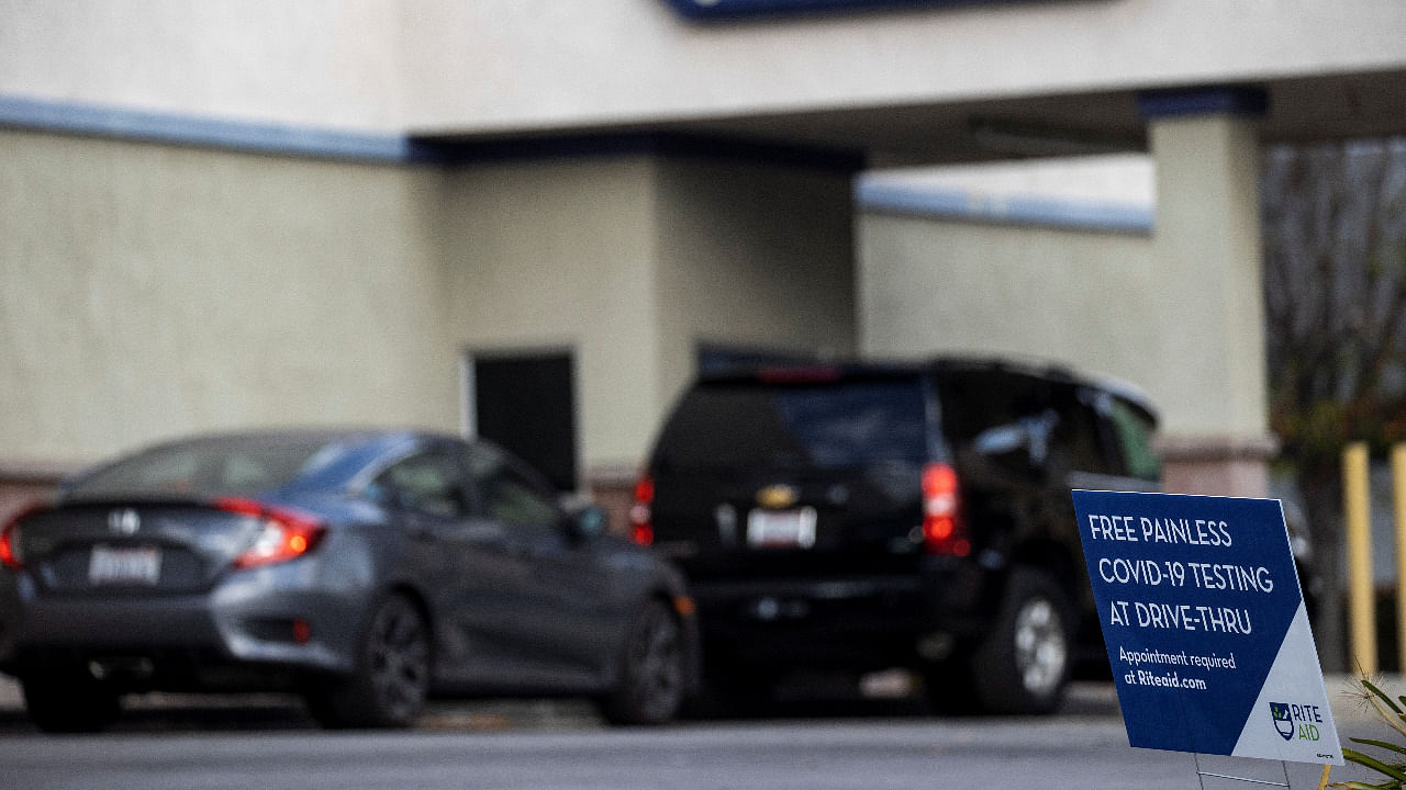 Vehicles line up at a self-swabbing Covid-19 test at a Rite Aid drive-thru during the outbreak of Covid-19, in Pasadena, California. Credit: Reuters Photo