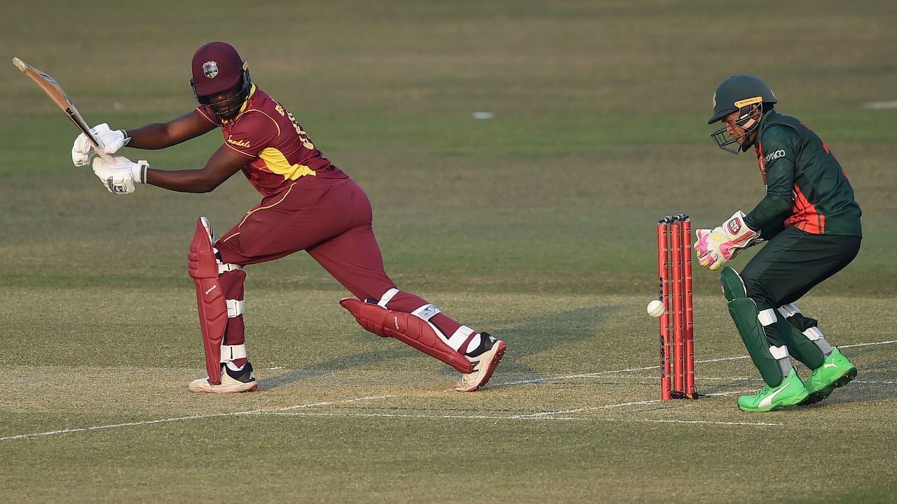 West Indies’ Nkrumah Bonner (L) plays a shot during the third and final one day international (ODI) cricket match between Bangladesh and West Indies at the Zohur Ahmed Chowdhury Stadium in Chittagong on January 25, 2021. Credit: AFP Photo