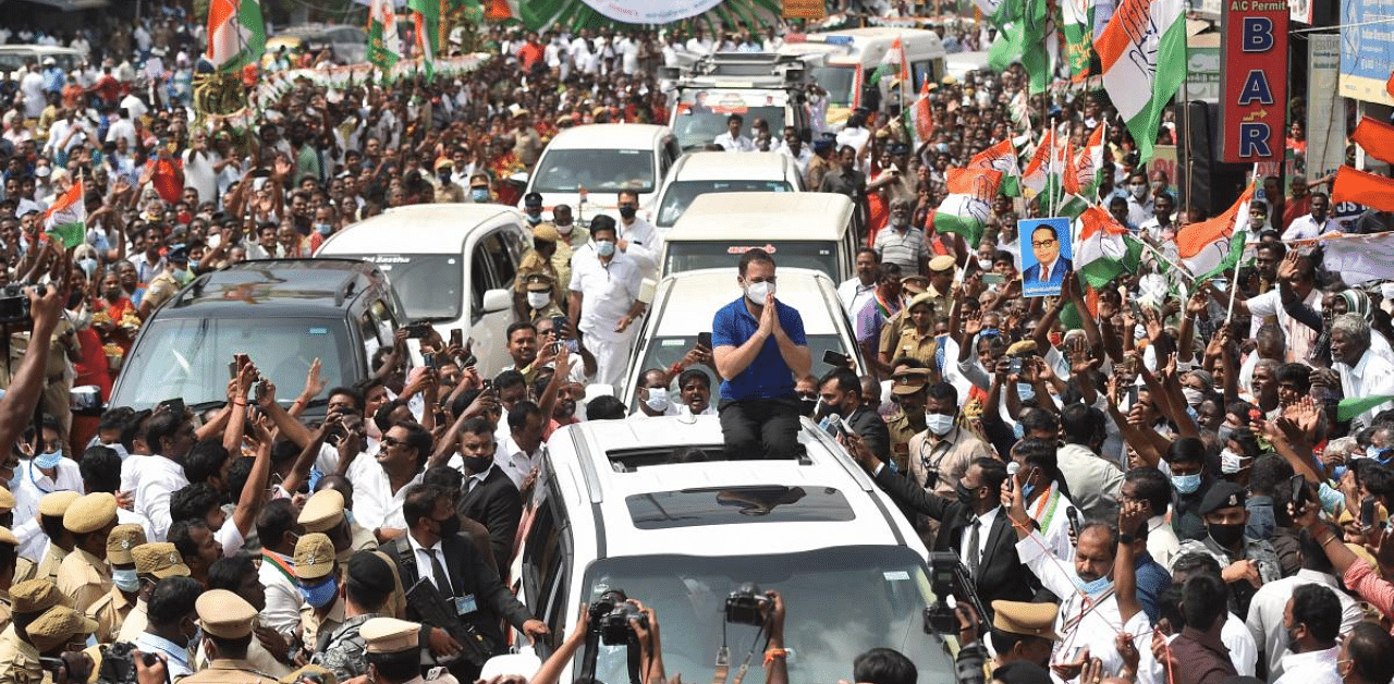 Congress leader Rahul Gandhi greets supporters during his election campaign for the forthcoming Tamil Nadu Assembly polls, in Karur. Credit: PTI Photo