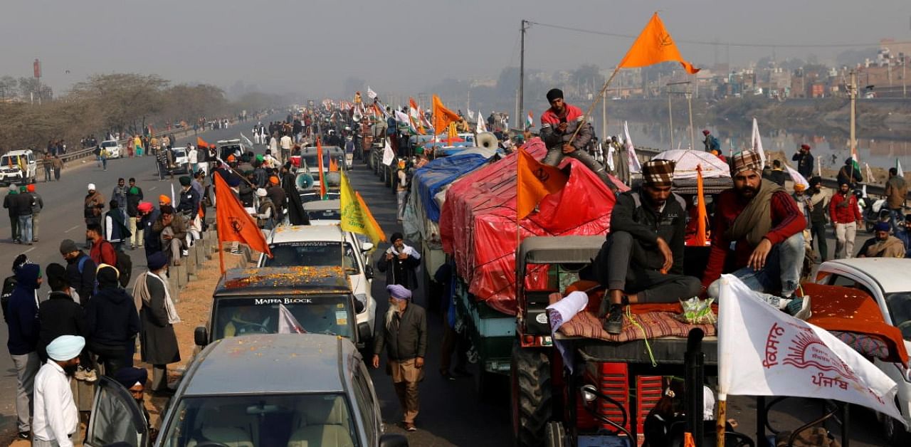 Farmers take part in a tractor rally to protest against farm laws on the occasion of India's Republic Day in Delhi, India, January 26, 2021. Credit: Reuters Photo