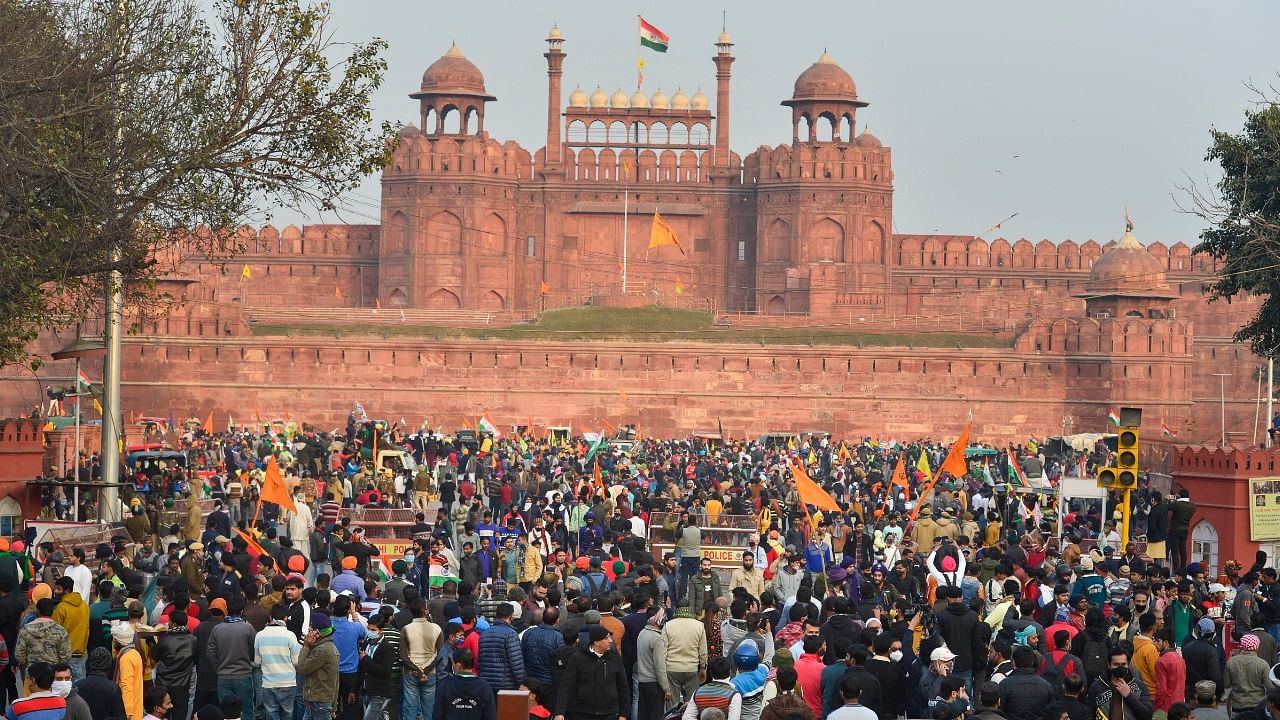 Farmers gather at Red Fort during their tractor parade on Republic Day, in New Delhi, Tuesday, January 26, 2021. Credit: PTI Photo