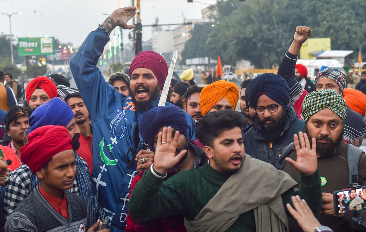 Protesting farmers and their supporters during their tractor march on Republic Day, at ITO in New Delhi, Tuesday, Jan. 26, 2021. Credit: PTI Photo