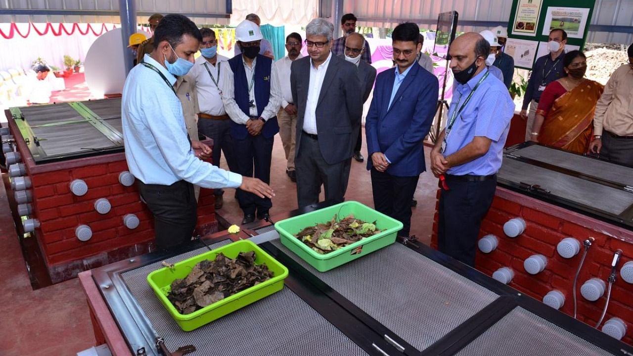 Mangalore Refinery Petrochemicals Ltd officials explain about vermicomposting unit to Sunil Kumar, joint secretary, Ministry of Petroleum and Natural Gas, at MRPL. Credit: Special arrangement.