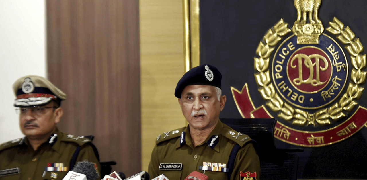 Delhi Police Commissioner SN Shrivastava with Special Commissioner of Police Dependra Pathak addresses a press conference, in New Delhi. Credit: PTI Photo