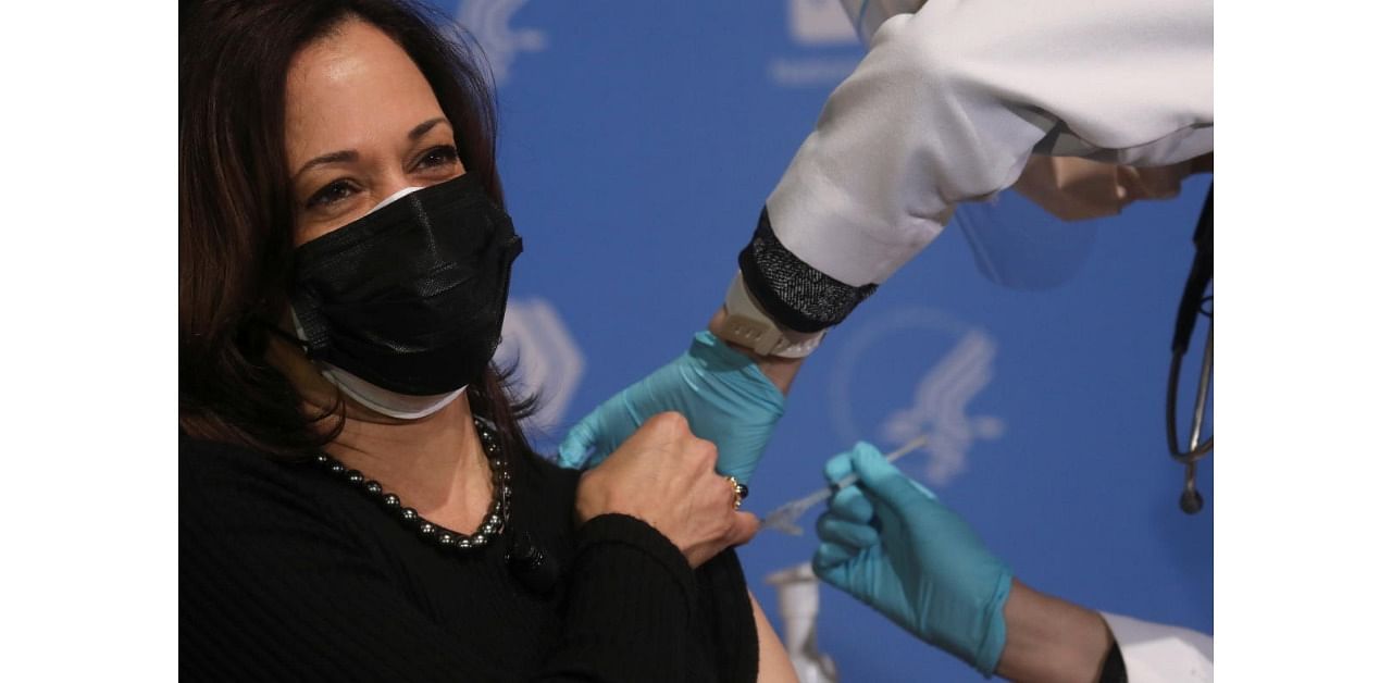U.S. Vice President Kamala Harris receives her second dose of the Moderna coronavirus disease (COVID-19) vaccine from nurse practitioner Judy Lai Yee Chan at the National Institutes of Health in Bethesda, Maryland, U.S. January 26, 2021. Credit: Reuters Photo