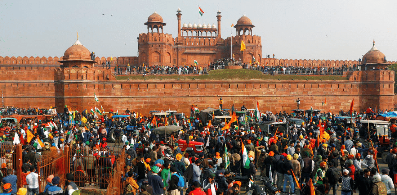  Farmers gather in front of the historic Red Fort during a protest against farm laws introduced by the government. Credit: Reuters Photo