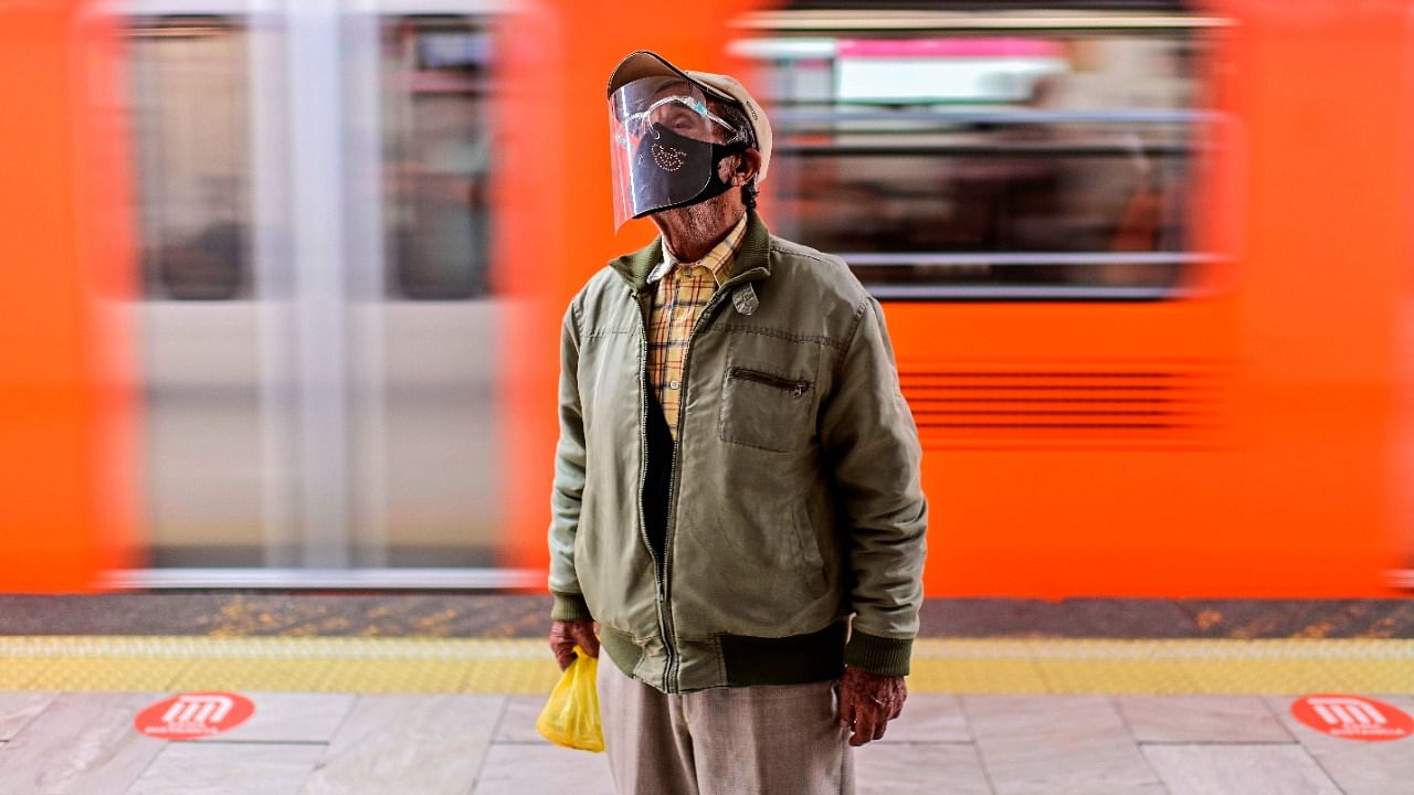 A man wears a face mask as a preventive measure against the spread of coronavirus in a subway station in Mexico City. Credit: AFP Photo