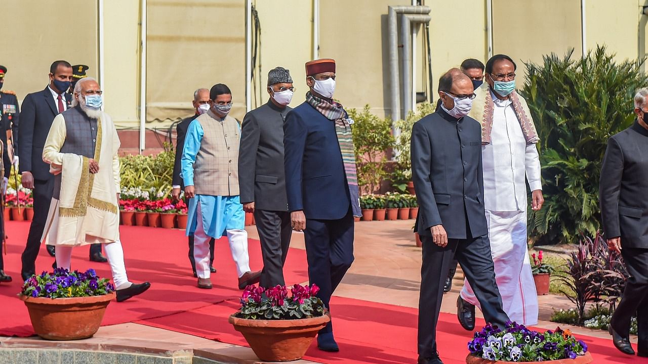 President Ram Nath Kovind accompanied by Prime Minister Narendra Modi, Vice President M. Venkaiah Naidu, Lok Sabha Speaker Om Birla and other dignitaries arrives to address the Budget Session, at Central Hall of Parliament House in New Delhi. Credit: PTI Photo