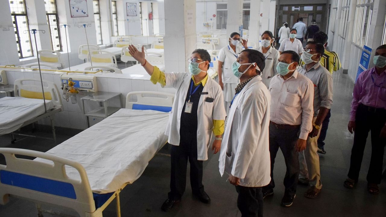 Medical official during a set-up formation to provide treatment to Covid-19 affected patients, at a special ward in a hospital, Prayagraj. Credit: PTI File Photo
