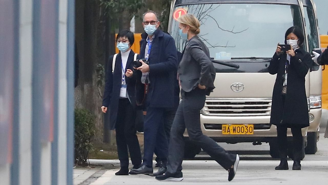Members of the World Health Organization (WHO), tasked with investigating the origins of the Covid-19pandemic, Thea Fischer and Peter Ben Embarek walk outside Jinyintan Hospital in Wuhan, Hubei province, China. Credit: Reuters Photo.