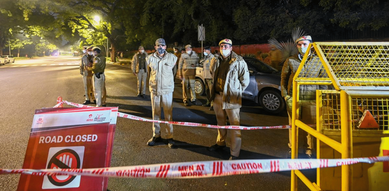 Police close off a street after an explosion near the Israeli embassy in New Delhi. Credit: AFP Photo