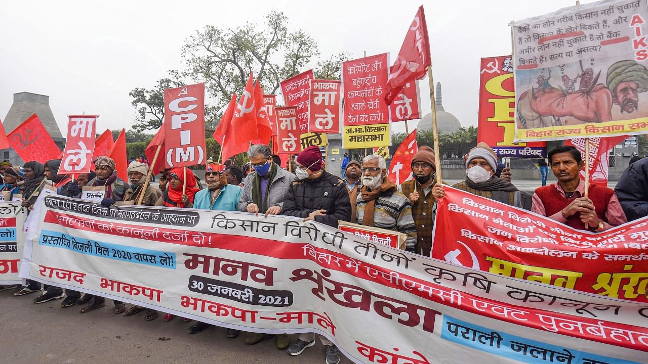 CPI-ML General Secretary Dipankar Bhattacharya and others Grand Alliance leaders during a rally in solidarity with farmers protesting against the farm laws, in Patna, Saturday, January 30, 2021. Credit: PTI Photo