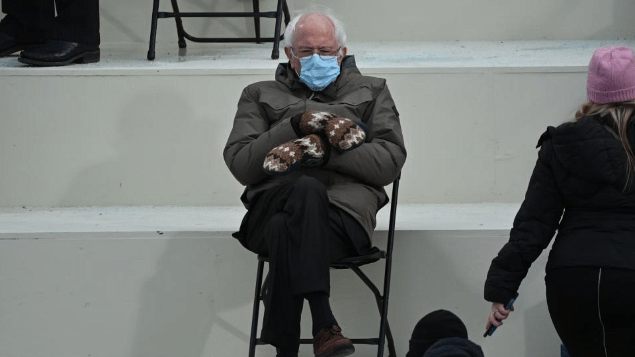 Senator Bernie Sanders (D-Vermont) sits in the bleachers on Capitol Hill before Joe Biden is sworn in as the 46th US President at the US Capitol in Washington, DC.  Credit: AFP File Photo