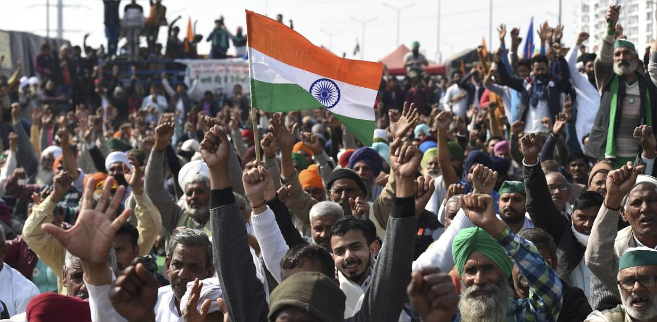 Farmers during their onging protest against the new farm laws at Ghazipur, in New Delhi. Credit: PTI. 