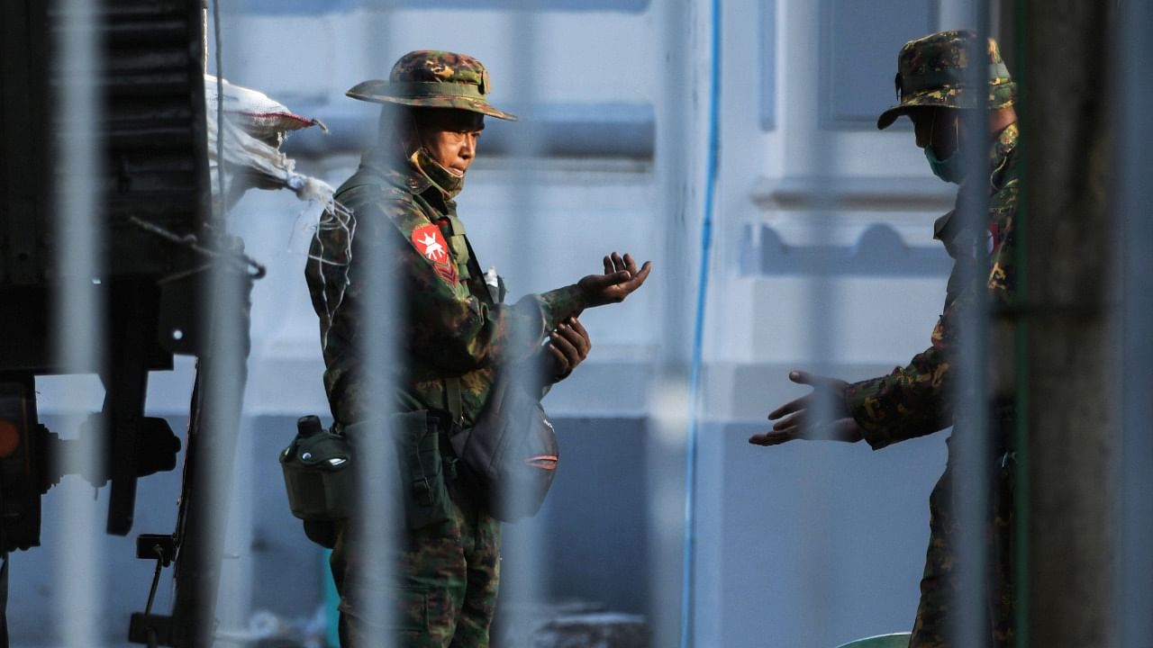 Myanmar soldiers are seen inside City Hall in Yangon, Myanmar February 1, 2021. Credit: Reuters Photo