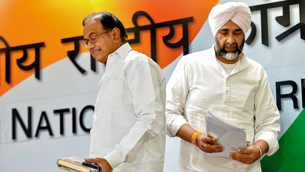 Former finance minister P Chidambaram with Punjab Finance Minister Manpreet Singh Badal. Credit: PTI Photo