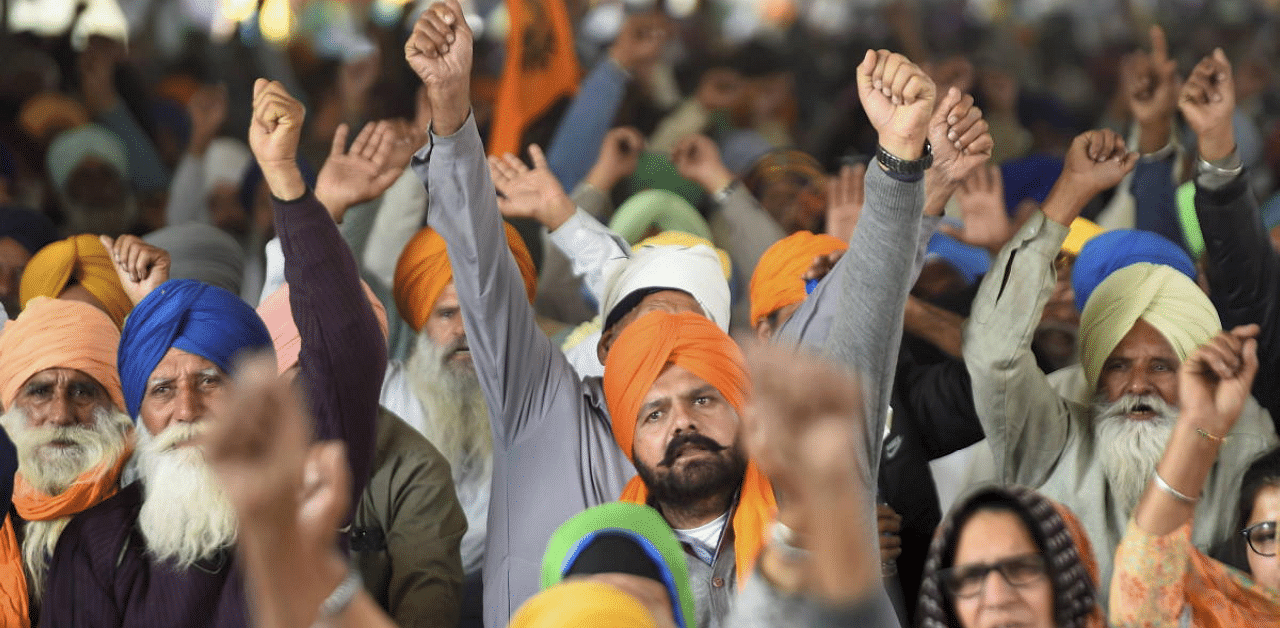 Farmers protest at Singhu Border. Credit: PTI Photo