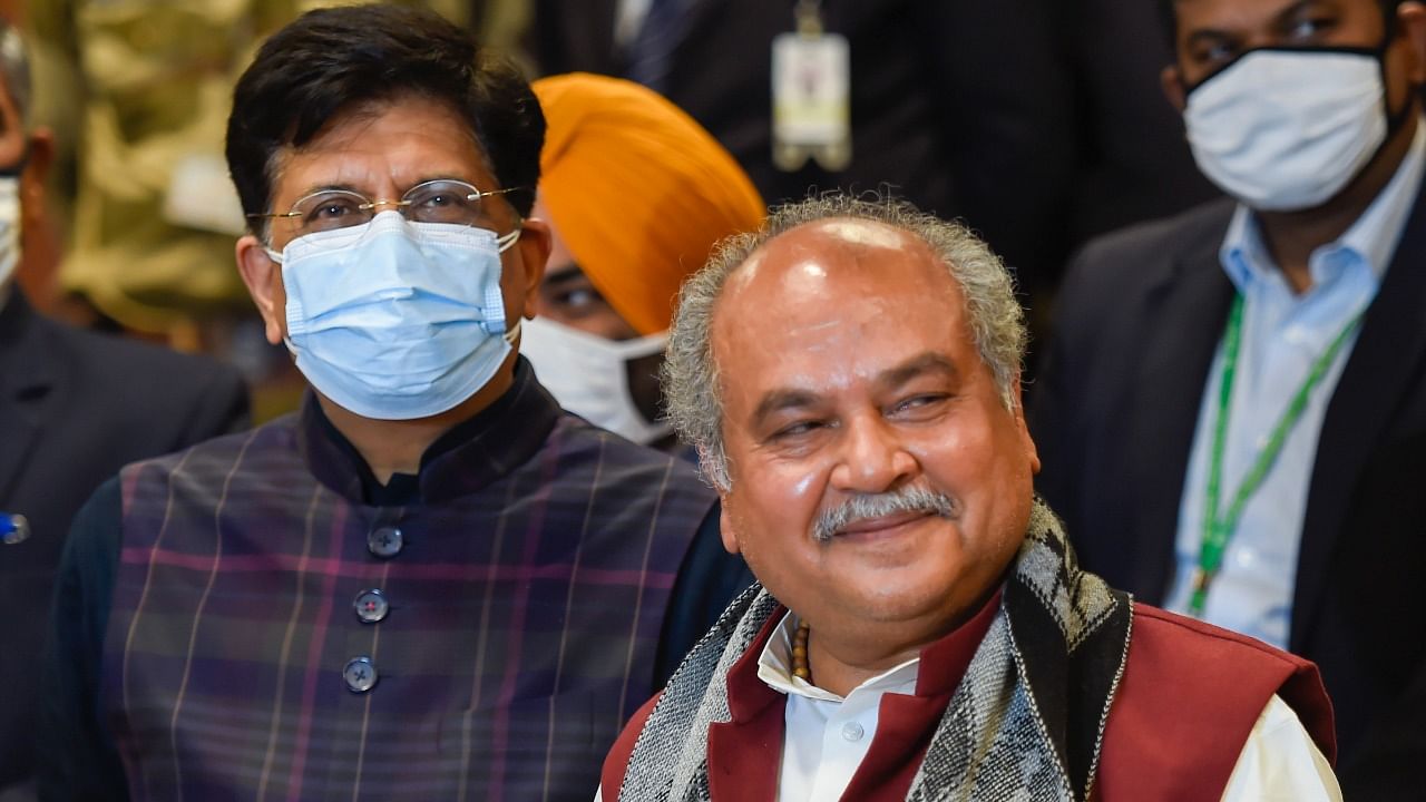 Union Minister for Agriculture and Farmers' Welfare Narendra Singh Tomar with Minister for Commerce and Industry Piyush Goyal addresses a press conference after the 11th round of talks with farmers' representatives on new farm laws, at Vigyan Bhavan in New Delhi. Credit: PTI Photo