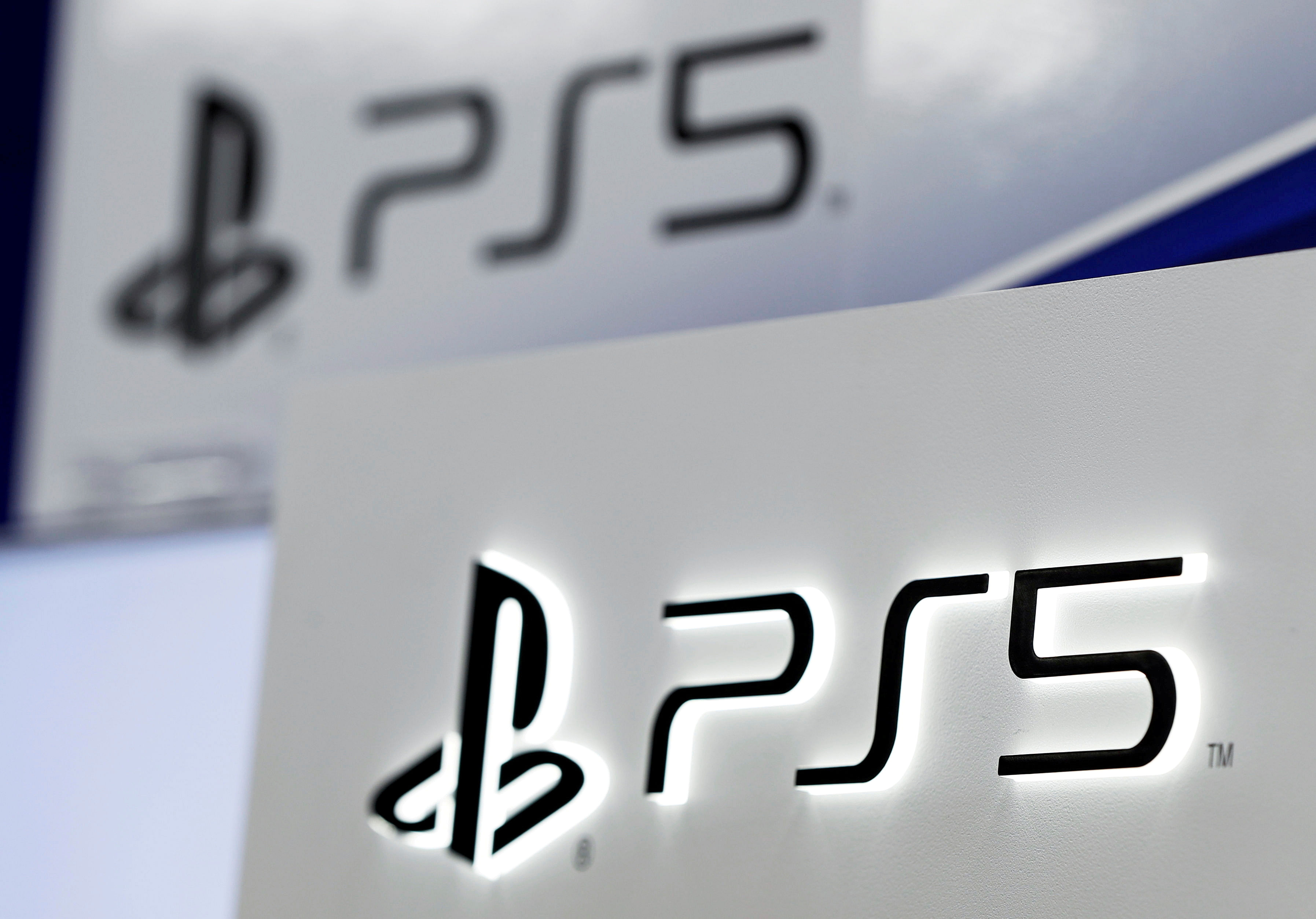 The logos of Sony's PlayStation 5 are displayed at the consumer electronics retailer chain Bic Camera, ahead of its official launch, in Tokyo, Japan November 10, 2020. Credit: REUTERS
