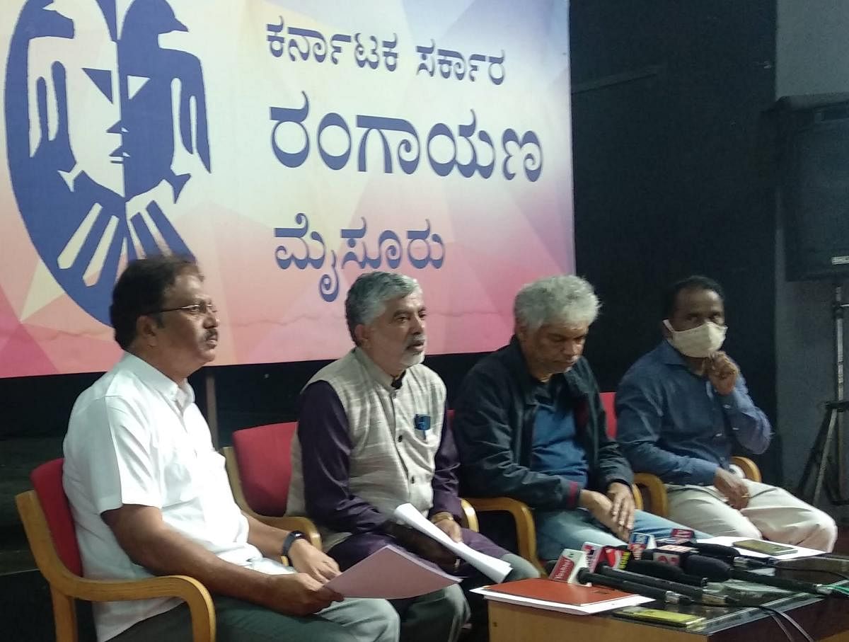 Rangayana Director Addanda C Cariyappa speaks to media persons in Mysuru on Wednesday. Honorary secretary of S L Bhyrappa Sahitya Prathistana G L Shekar, director Prakash Belavadi and Deputy Director of Rangayana V N Mallikarjuna Swamy are seen. DH Photo