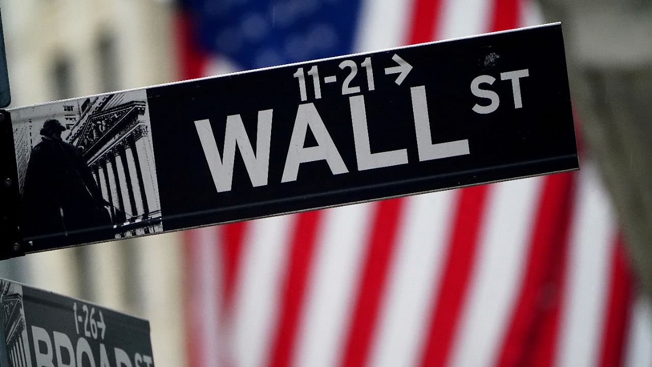  A Wall Street sign outside the New York Stock Exchange in New York City, New York, US. Credit: Reuters File Photo.