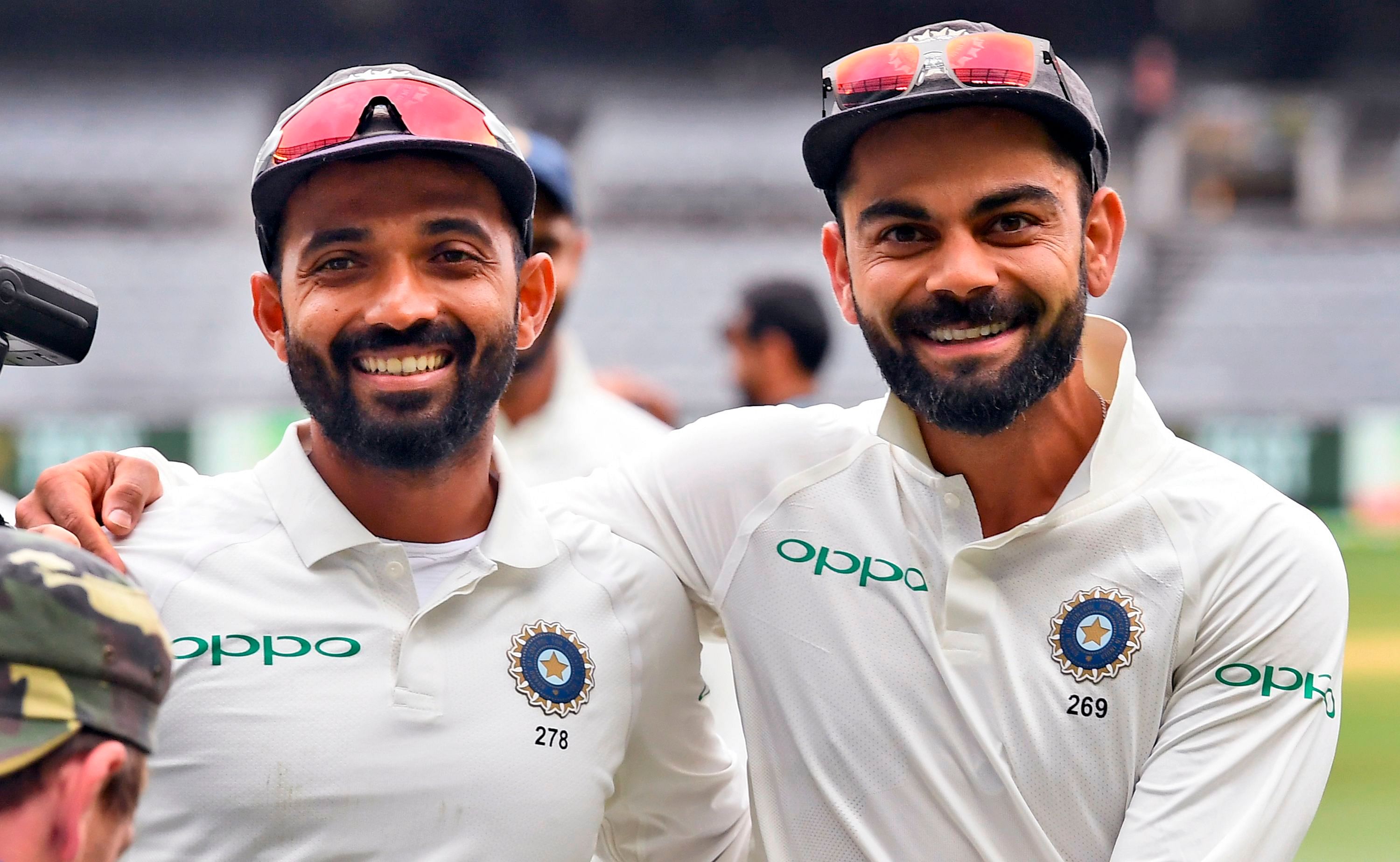Skipper Virat Kohli (right) heaped praise on Ajinkya Rahane for leading India to a sensational series win in Australia in his absence. AFP FILE PHOTO   