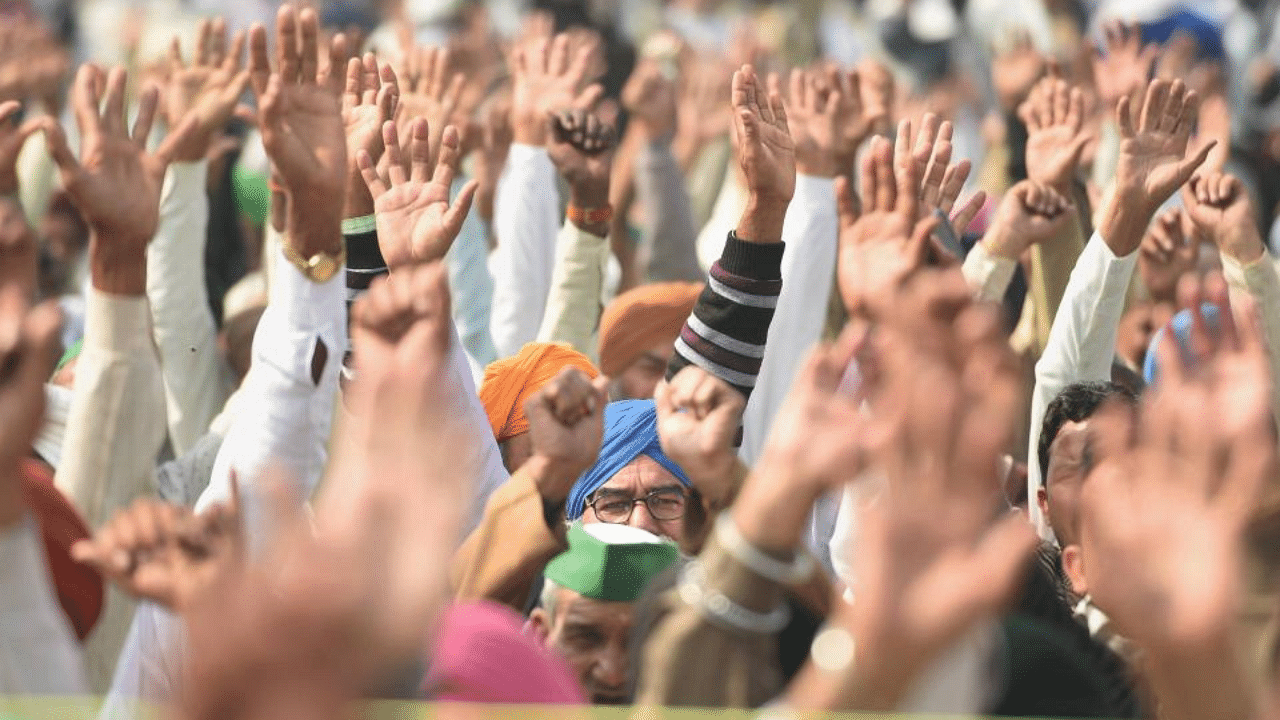  Farmers during their ongoing protest against the new farm laws, at Ghazipur border in New Delhi, Tuesday, Feb. 02, 2021. Credit: PTI Photo