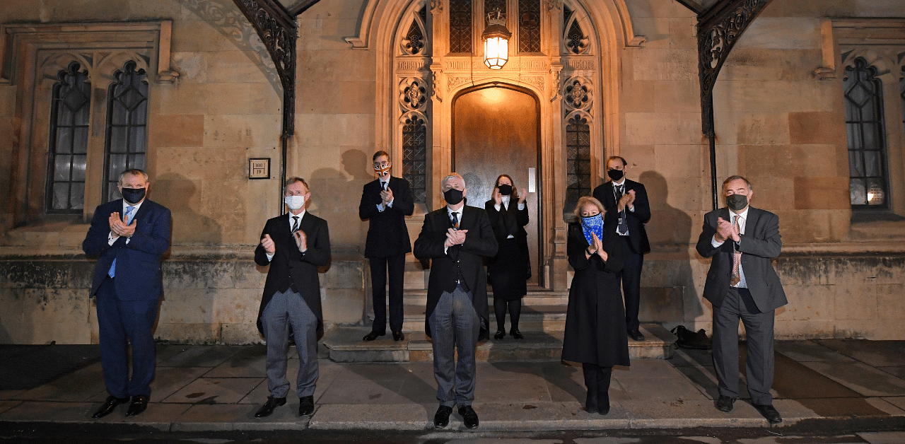 National clap for late Captain Sir Tom Moore and all NHS workers, in London. Credit: Reuters Photo