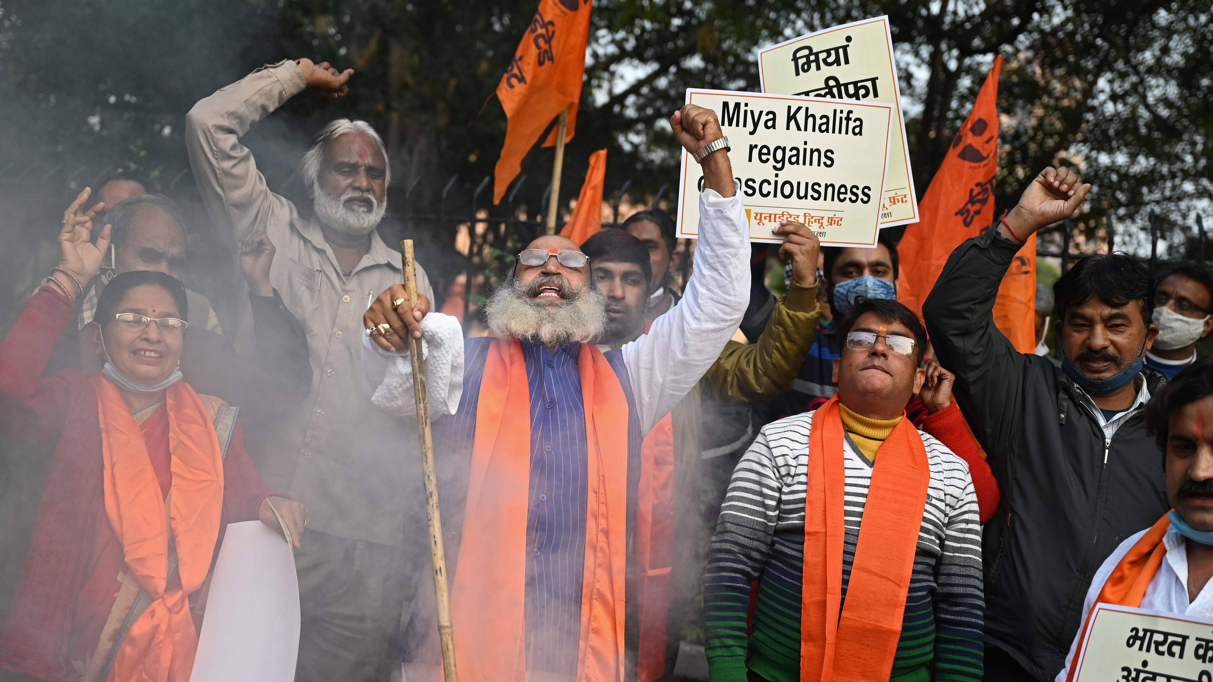 Activists of United Hindu Front (UHF) hold placards and shout slogans during a demonstration in New Delhi on February 4, 2021, after Swedish climate activist Greta Thunberg and Barbadian singer Rihanna. Credit: AFP