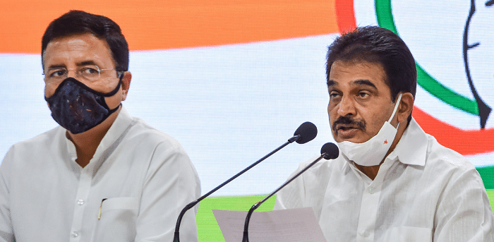 Congress leader KC Venugopal (R) with party spokesperson Randeep Surjewala. Credit: PTI Photo