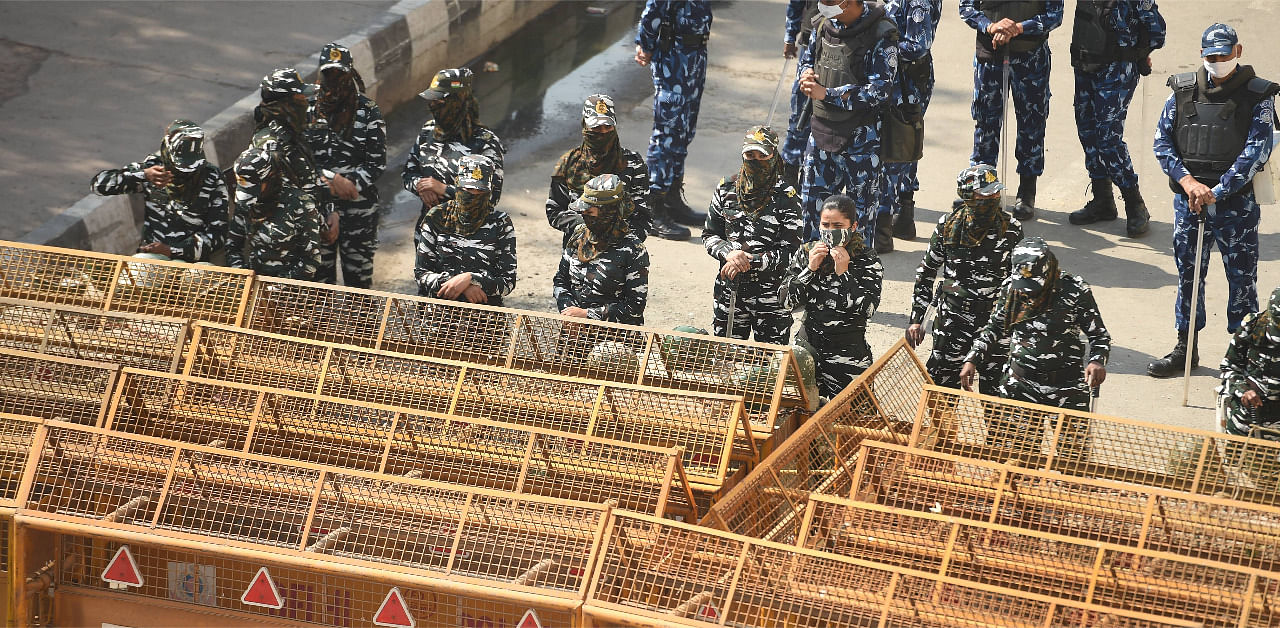 Tight security arrangements near the site of farmers' protest against new farm laws, at Ghazipur border, in New Delhi. Credit: PTI Photo