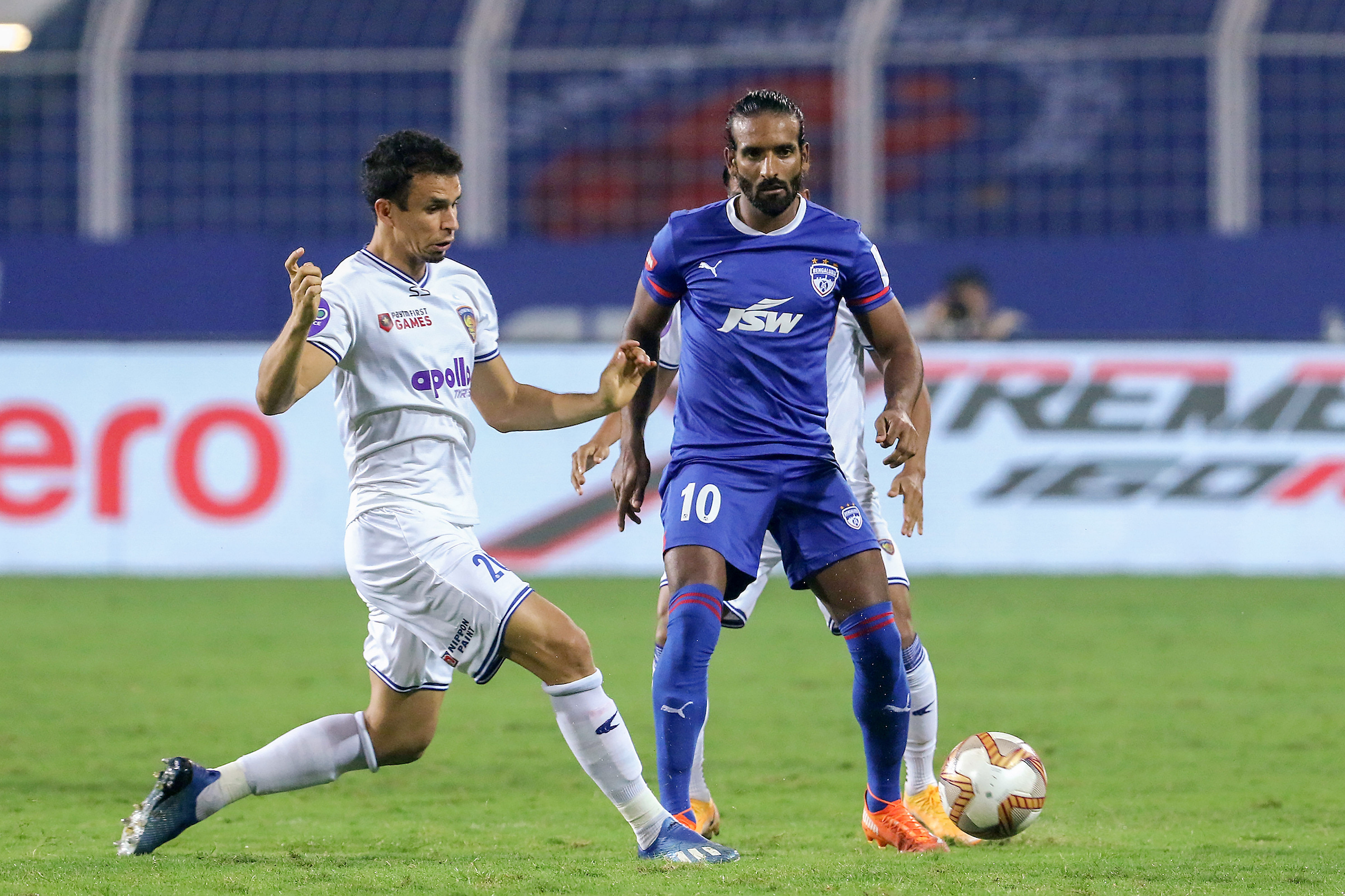 Emerson Gomes De Moura of Chennaiyin FC and Harmanjot Singh Khabra of Bengaluru FC in action during the Indian Super League match between Bengaluru FC and Chennaiyin FC. Credit: PTI Photo