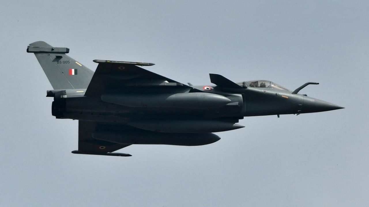 An Indian Air Force's Rafale fighter jet flies past during the "Aero India 2021" air show at Yelahanka air base in Bengaluru. Credit: Reuters.