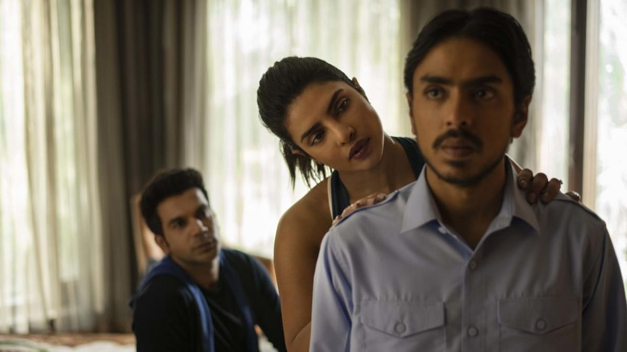 This image released by Netflix shows ‚ÄãRajkummar Rao, from left, Priyanka Chopra and Adarsh Gourav in a scene from "The White Tiger." Credit: AP/PTI.