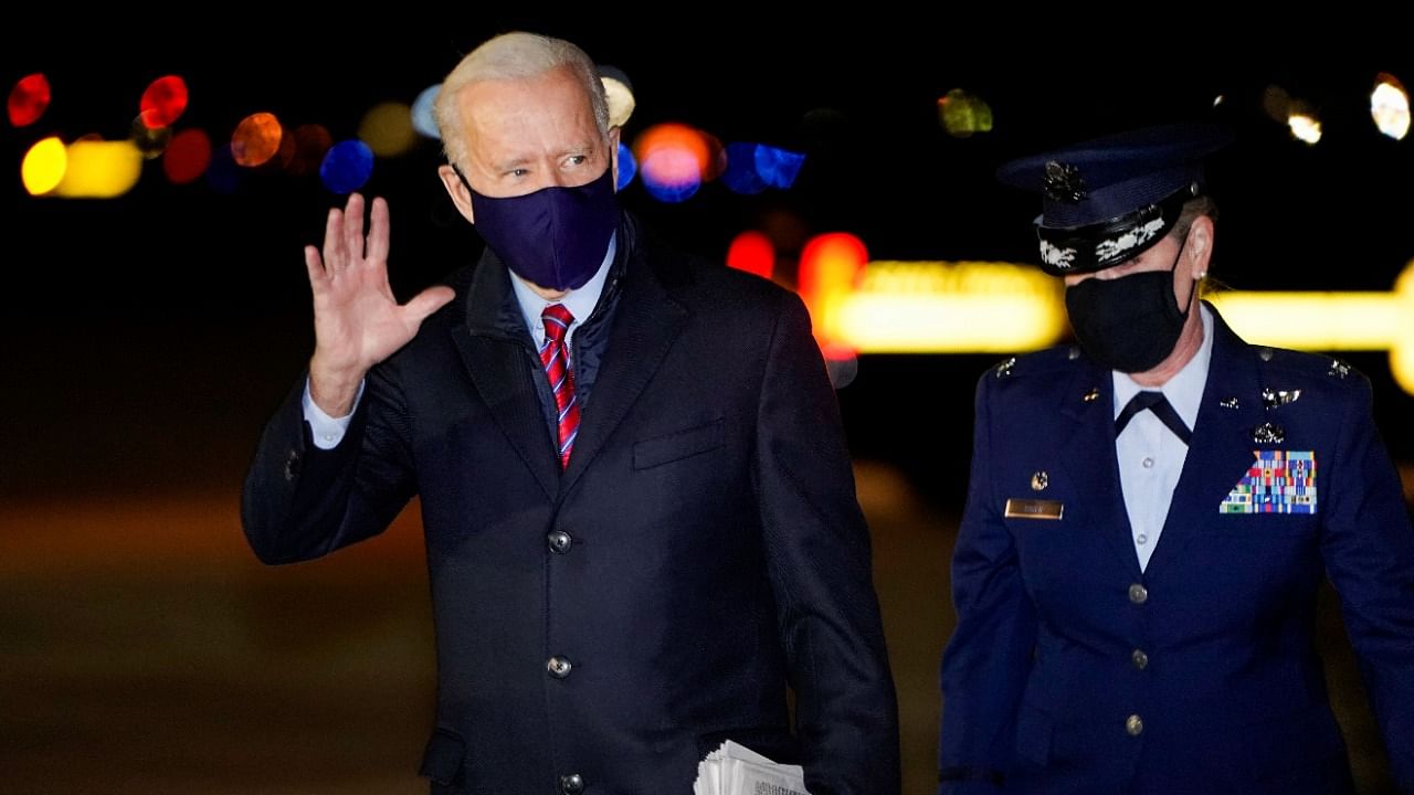 US President Joe Biden waves as he arrives at Newcastle, Delaware US. Credit: Reuters Photo.