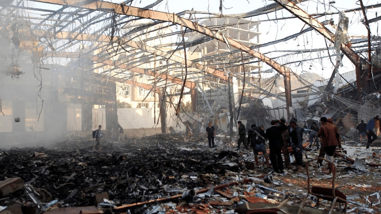 In this file photo taken on October 08, 2016 shows a general view of the destruction following reported airstrikes on a funeral hall by Saudi-led coalition air-planes on a building in the capital Sanaa.  Credit: AFP File Photo