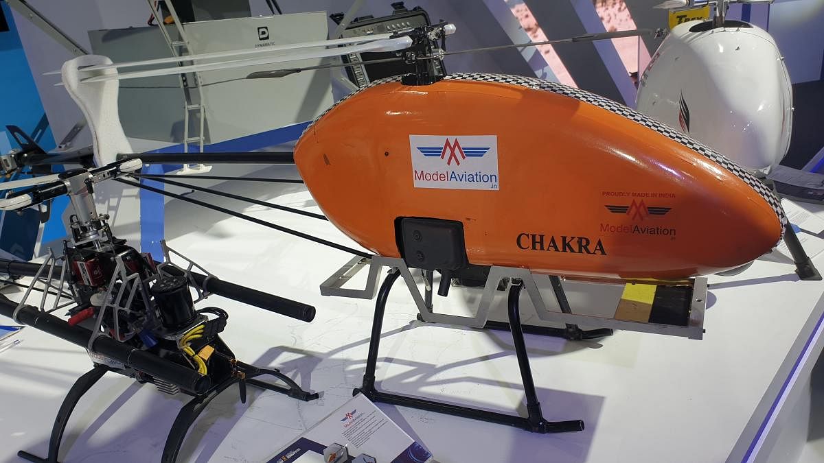 Helicopter drone startups, with DRDO and army tie-ups, showcase strides in desi technology at the India Pavilion of Aero India 2021 on Friday. DH PHOTO/RASHEED KAPPAN